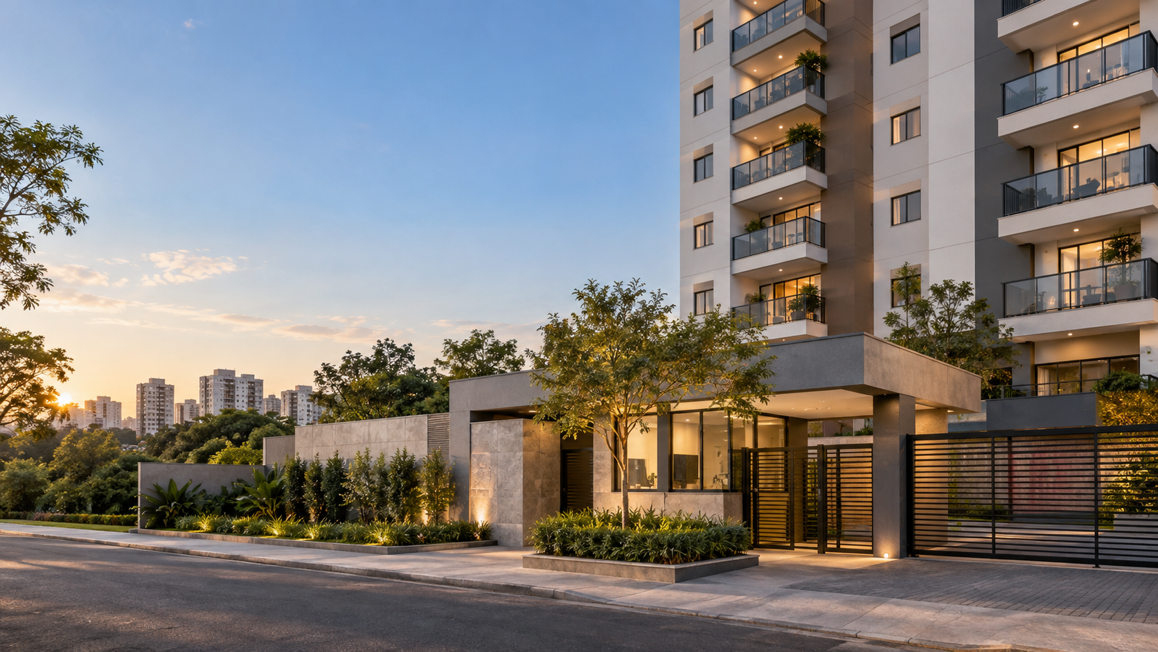 Entrada de um condomínio residencial contemporâneo ao final da tarde
